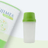 Shaker mit Regularis Plus im Hintergrund